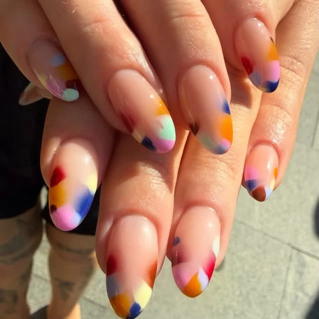 Multicoloured French tips with a soft nude base