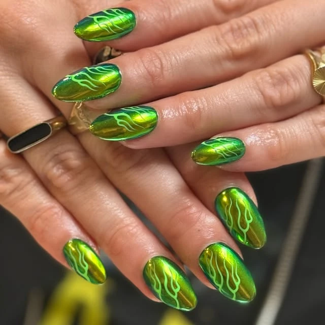 Bright green chrome nails with fine line details